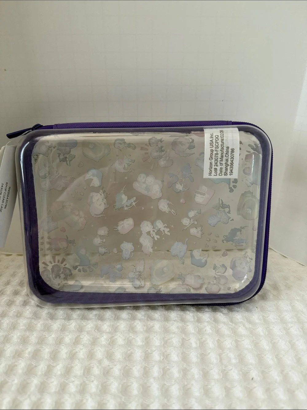Netflix K-POP Demon Hunters Chibi-Style Clear PVC Pencil Case with Purple Trim.